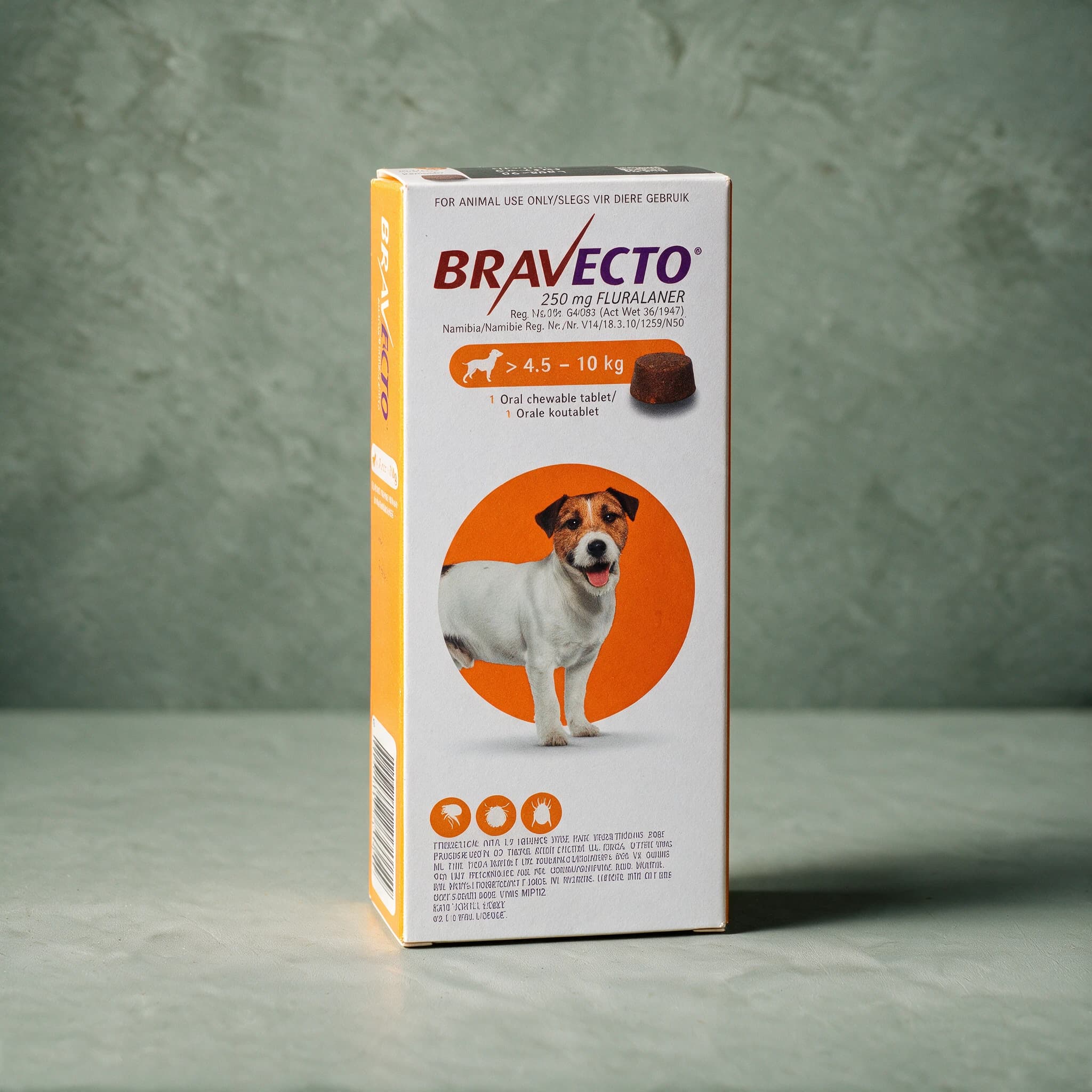 Orange-accented Bravecto Chewable Tablets for Dogs box, 4.5-10kg pack (250mg fluralaner), with the Bravecto logo, a round brown chewable tablet illustration, and SA registration number G4083 Act 36/1947 visible on the front panel.