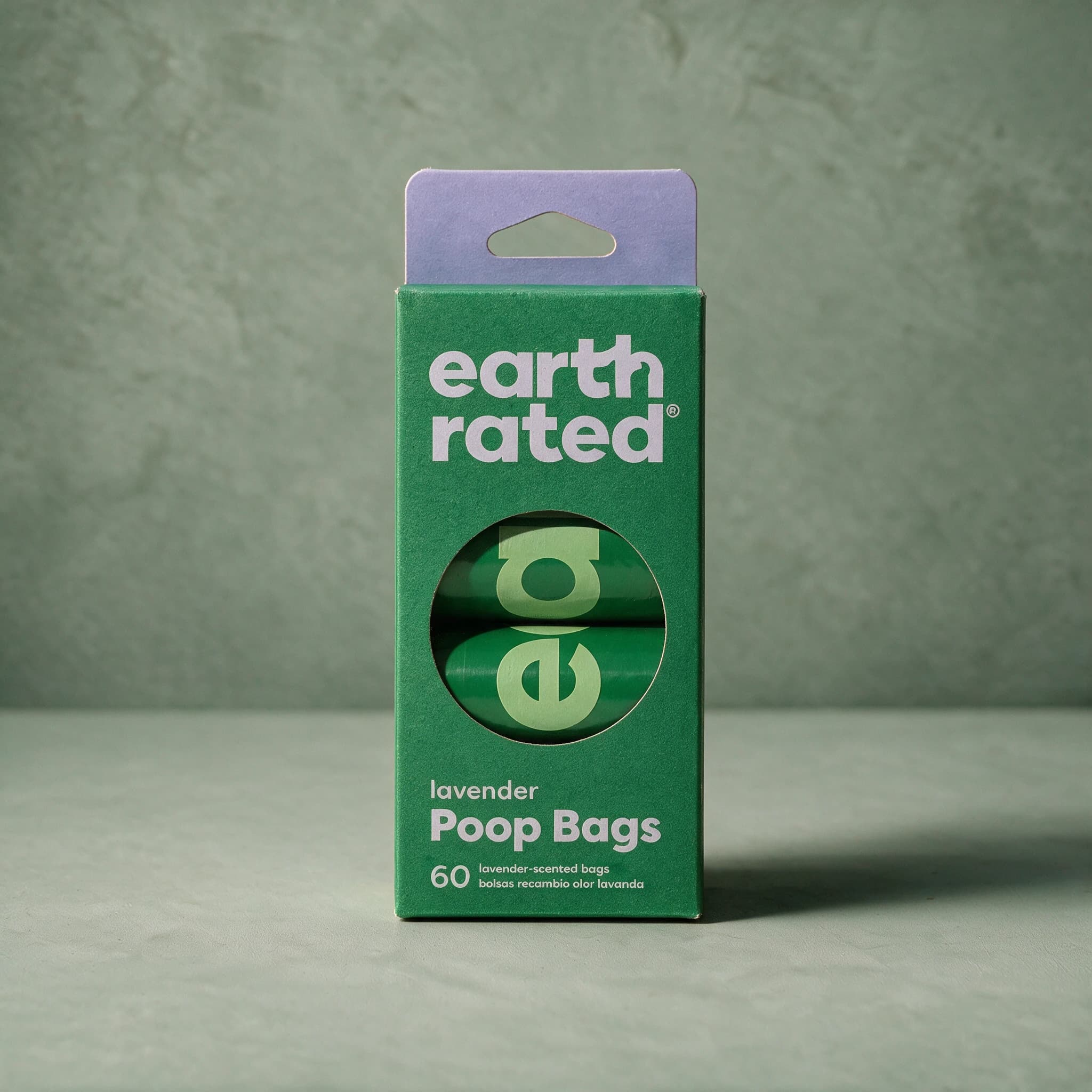 Purple and brown box of Earth Rated Lavender-scented Poop Bags, 60-count, with the Earth Rated logo on the front panel.