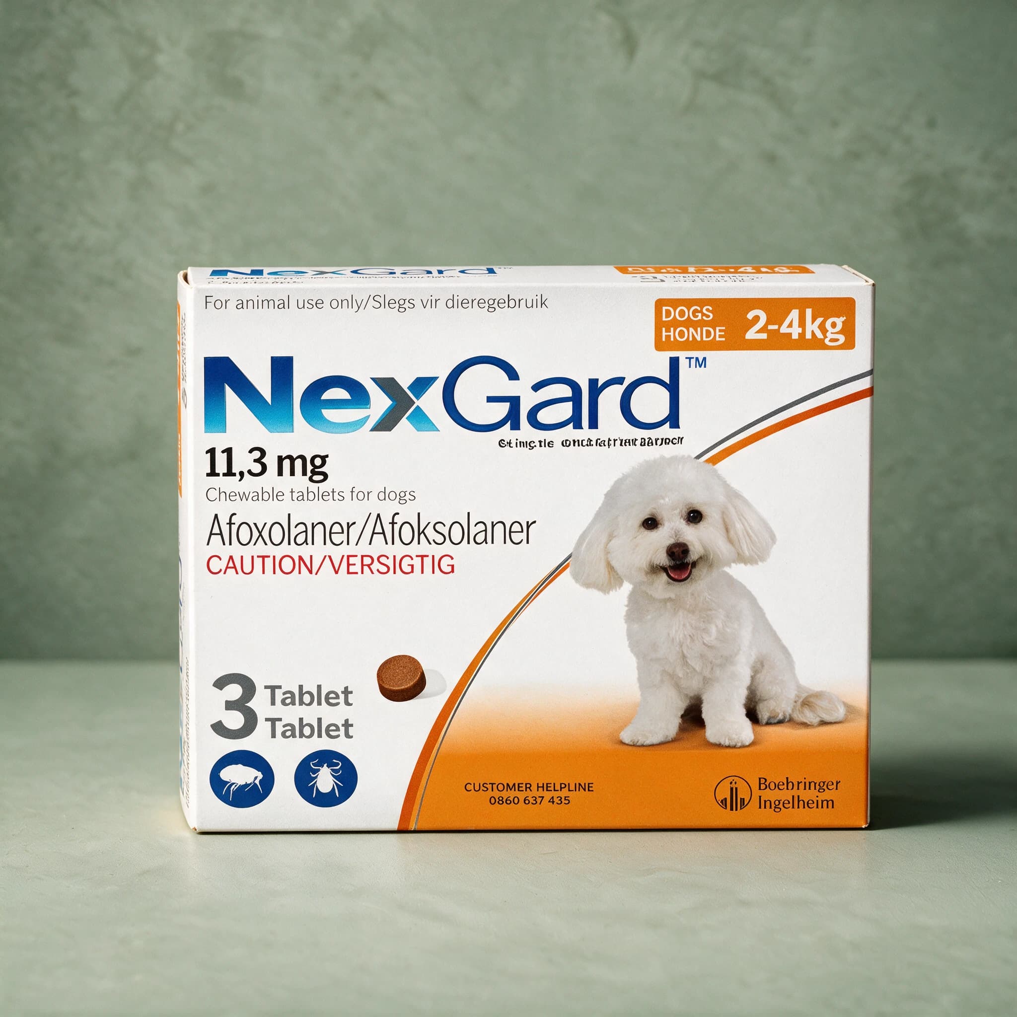 Orange and white box of NexGard Chewable Tablets for 2-4kg Dogs pack, with a small white dog picture and a single-tablet dosage illustration on the front panel.