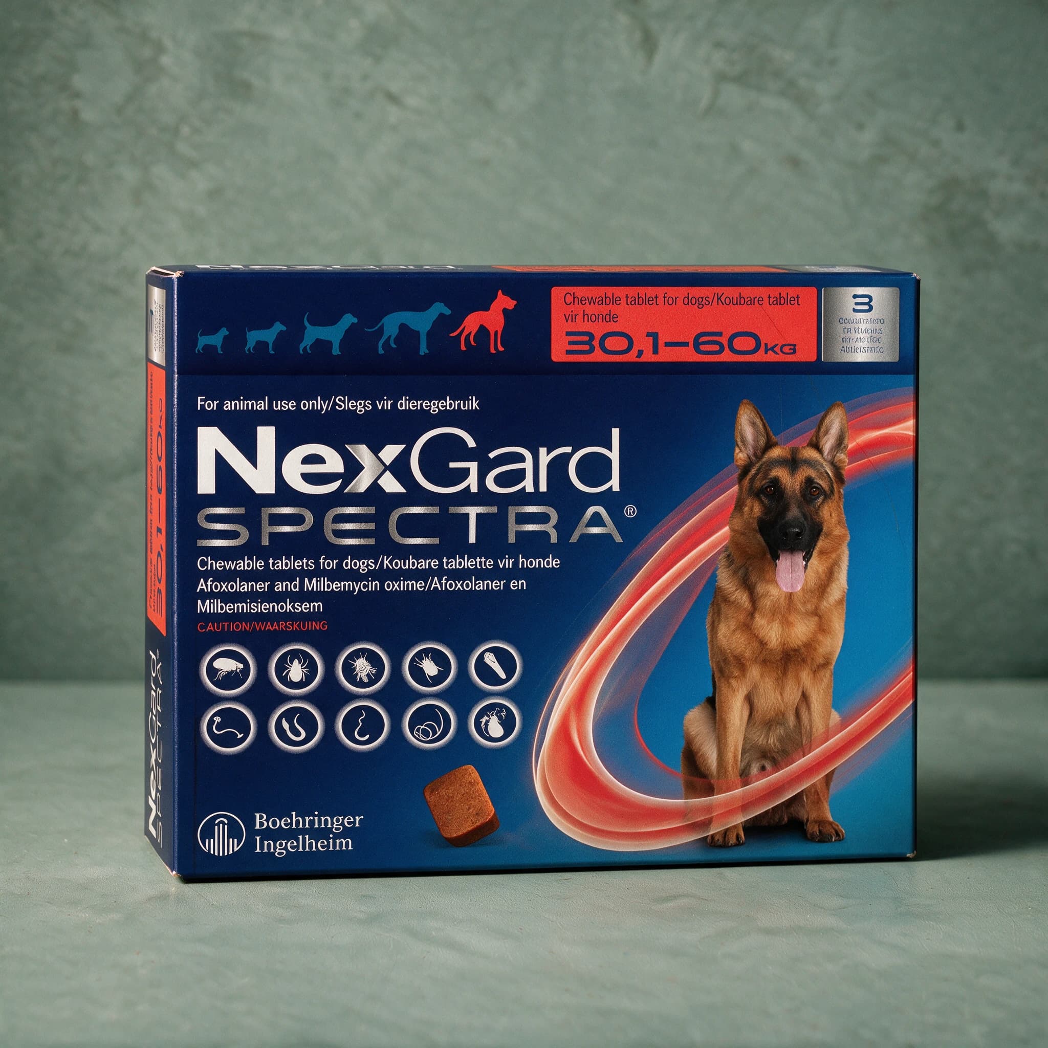 Red and navy box of NexGard Spectra Chewable Tablets for Dogs, 30.1-60kg pack, with the NexGard Spectra logo, German Shepherd dog picture and flea/tick/worm icon row on the front panel.