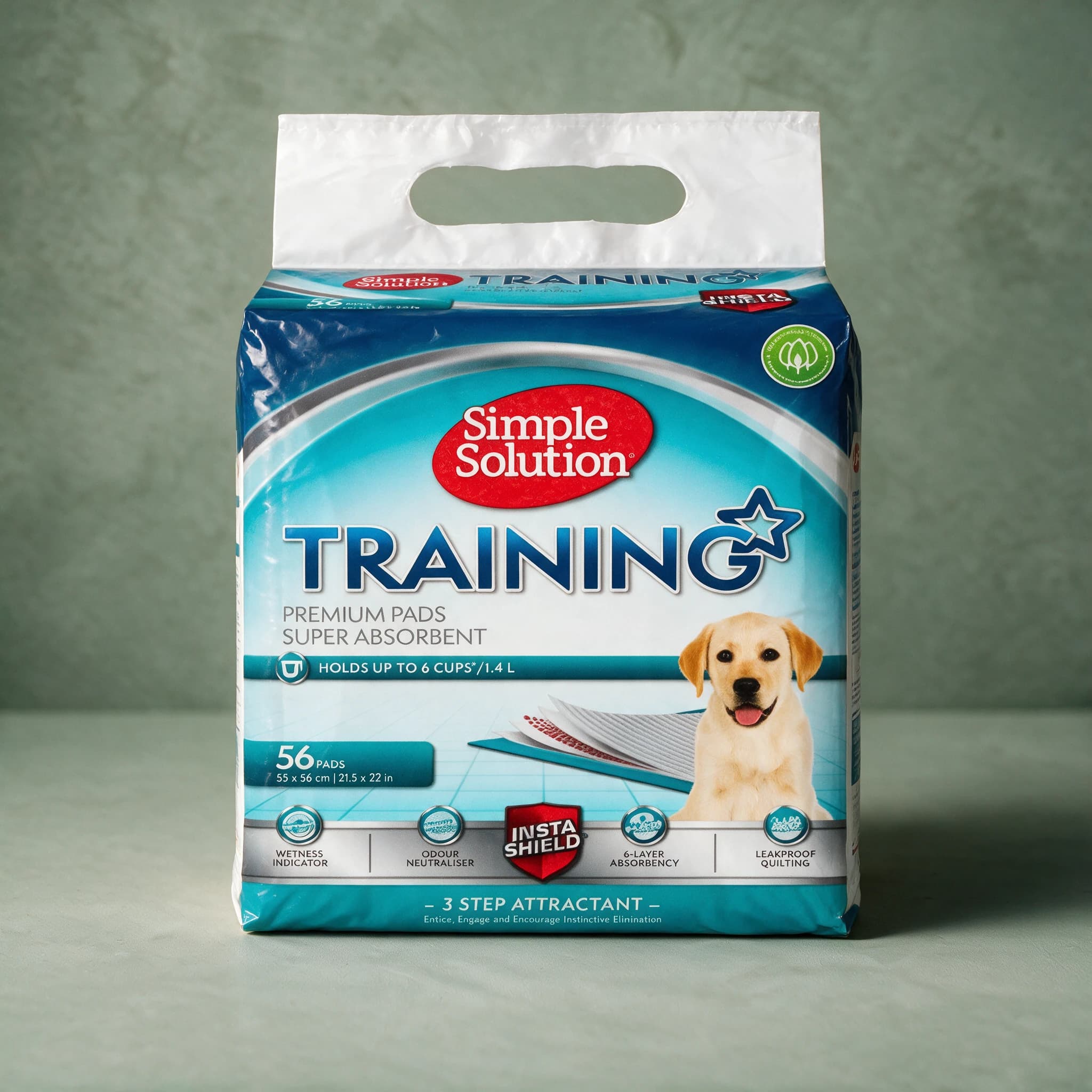Medium plastic-wrapped pack of 56 Simple Solution Training Premium Pads, with the Simple Solution logo and a puppy illustration on the front label.